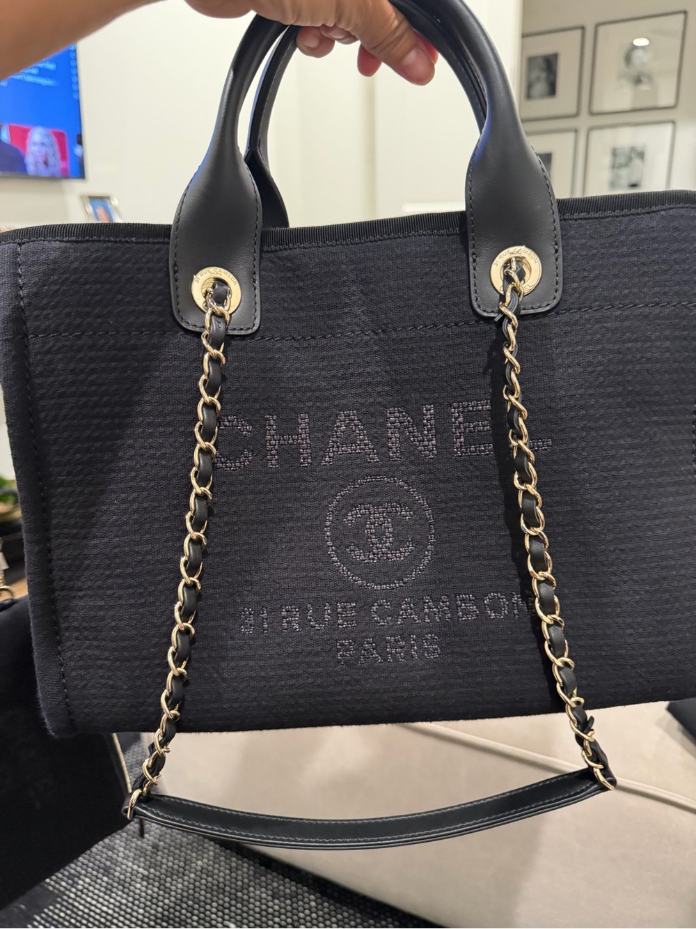 CHANEL Black Canvas Tote with Leather Handles and Gold Chain Accents - Picture 6 of 14